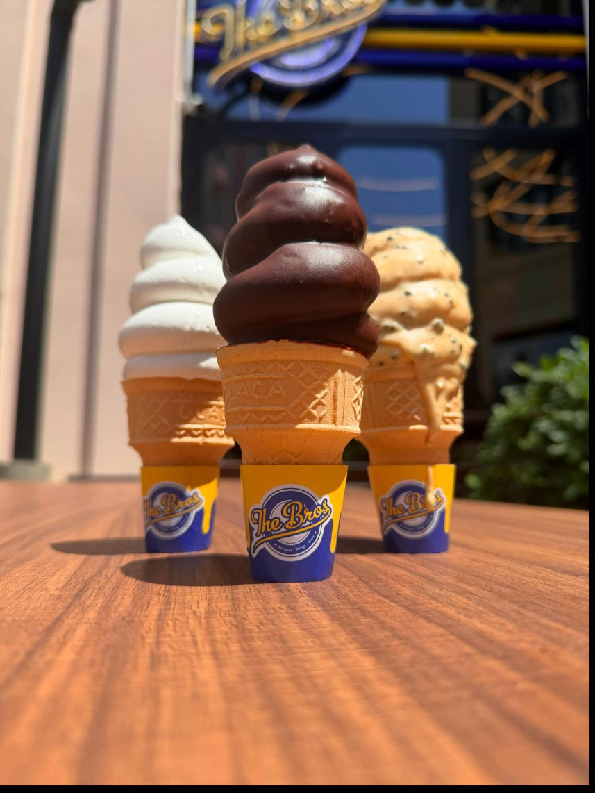 Three Merry Cream soft-serve cones in The Bros sleeves